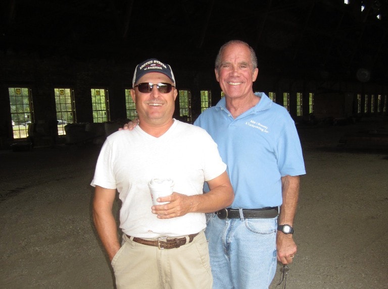 The Masons of AAA-1 Masonry & Tuckpointing: Howard Reese (right, in blue shirt) served as owner until 2004 when responsibilities passed to his son, Robert. After a 30-year tenure, Howard continues to meet with clients, draft scopes of work, and explain the craft to clients.