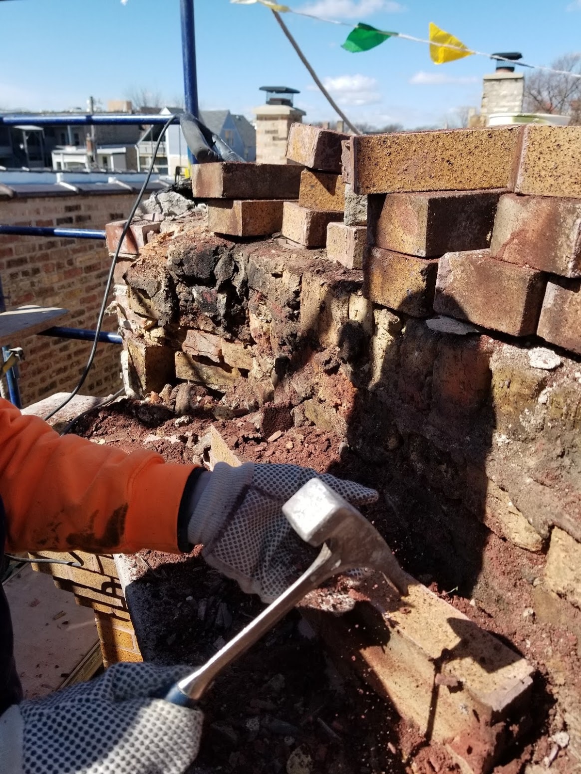 A mason shows the powdery mortar